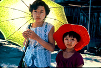 Girls with facial painting, Burma
